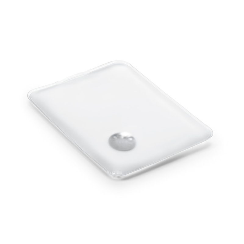 Rectangular reusable hand warmer with metal disc.