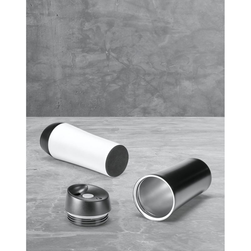 Disassembled travel mug on grey background.