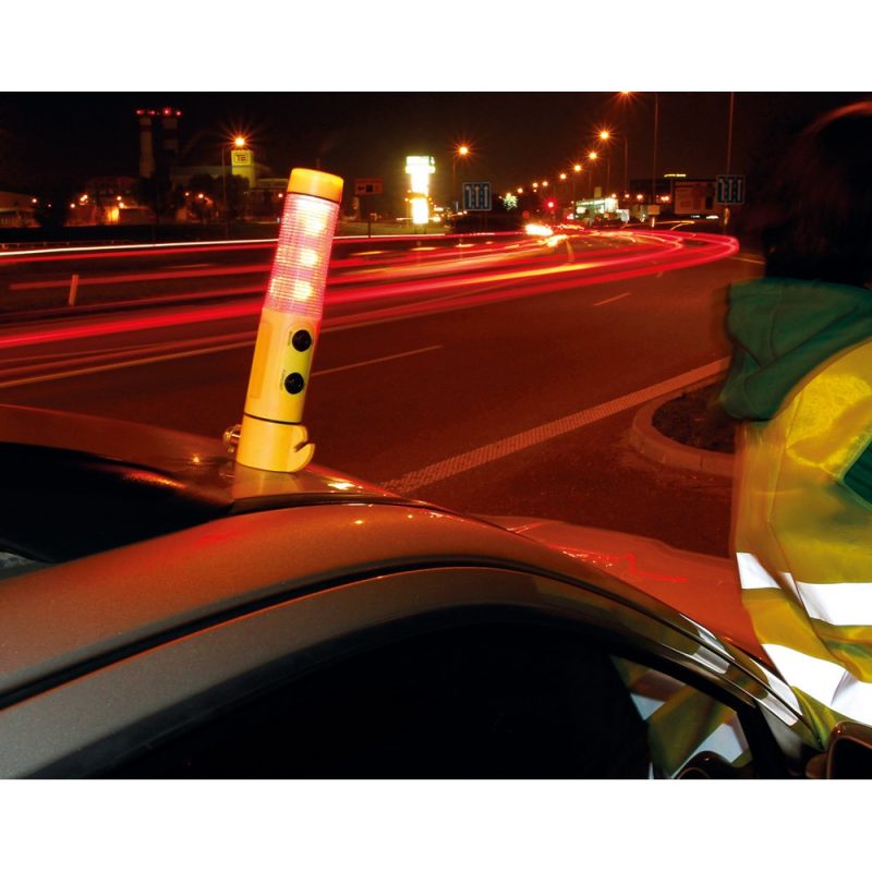 Emergency light on car roof at night