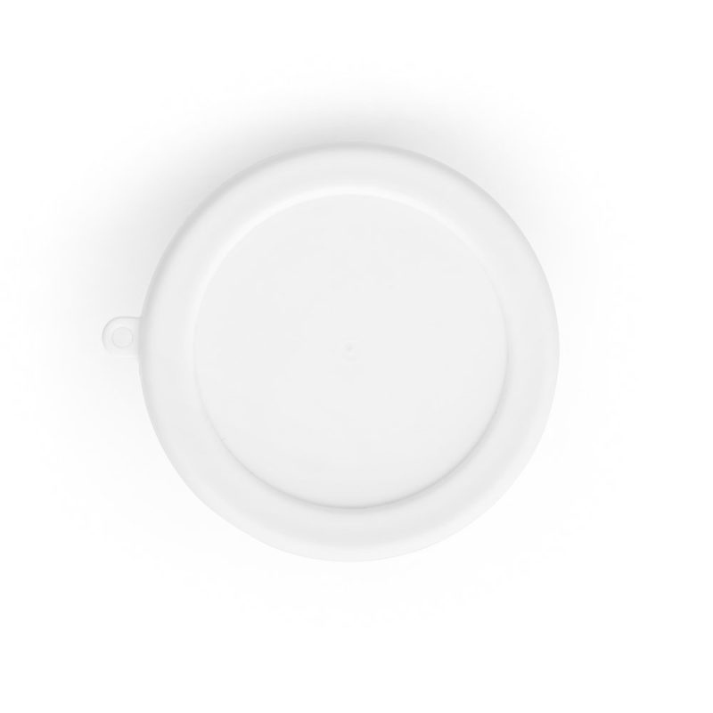 White plastic round container lid top view