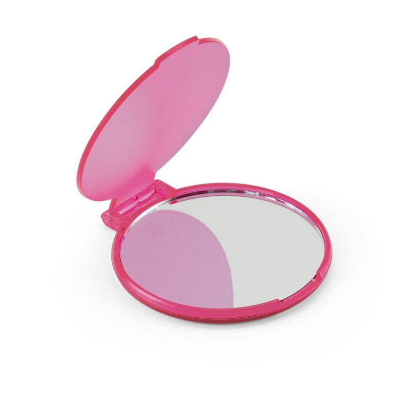 Pink compact mirror open on white background
