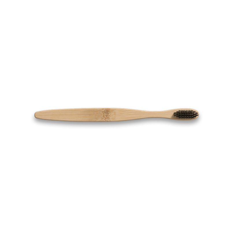 Bamboo toothbrush with black bristles on white background.