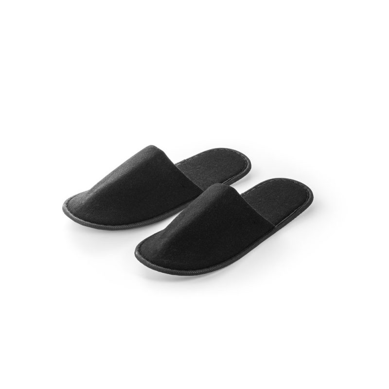 Black slippers on white background.