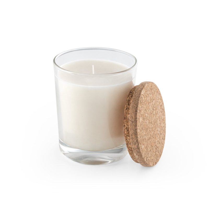 White candle in glass jar with cork lid.