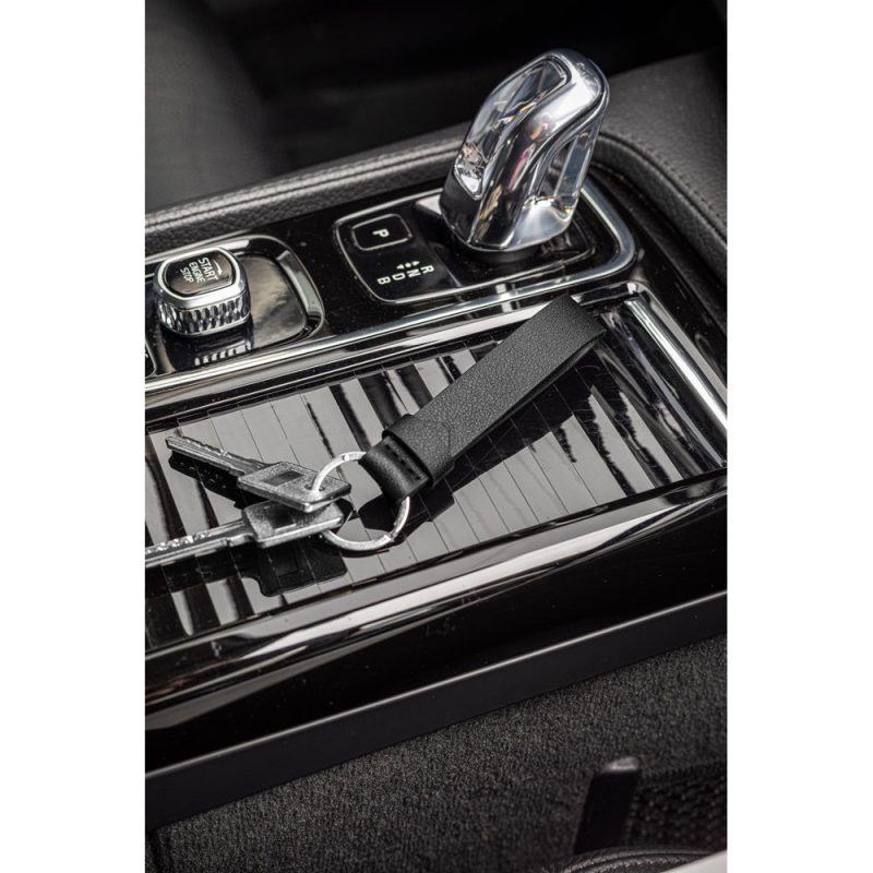 Car keys on centre console dashboard