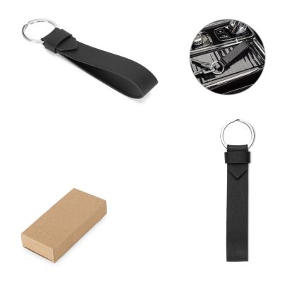Black leather keychain with box and car interior.