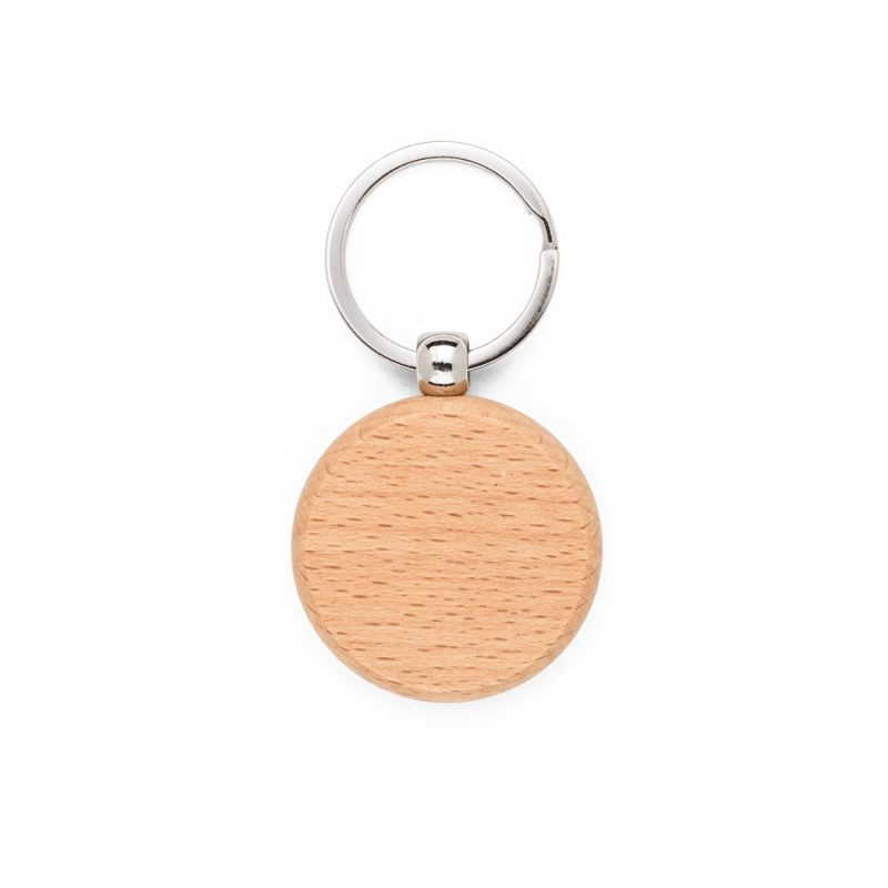 Round wooden keyring on white background