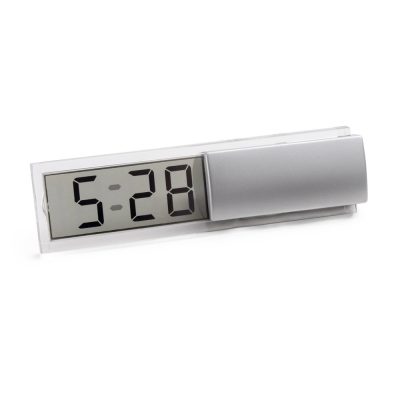 Digital desk clock showing 5:28.