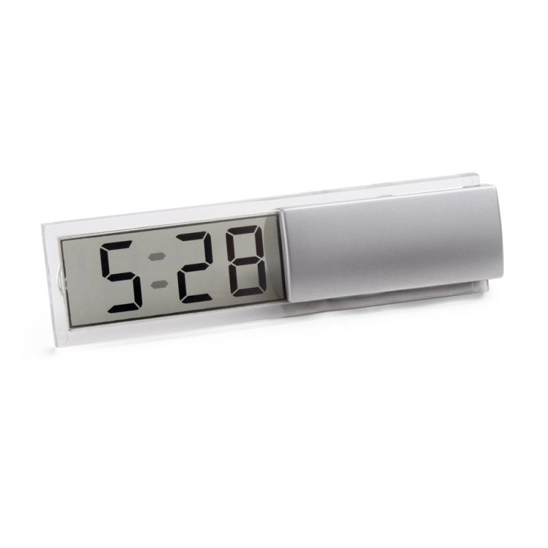 Digital desk clock showing 5:28.