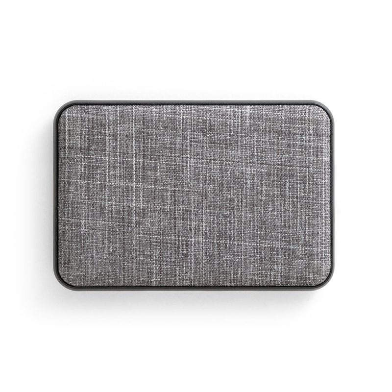 Rectangular grey fabric-covered speaker on white background.