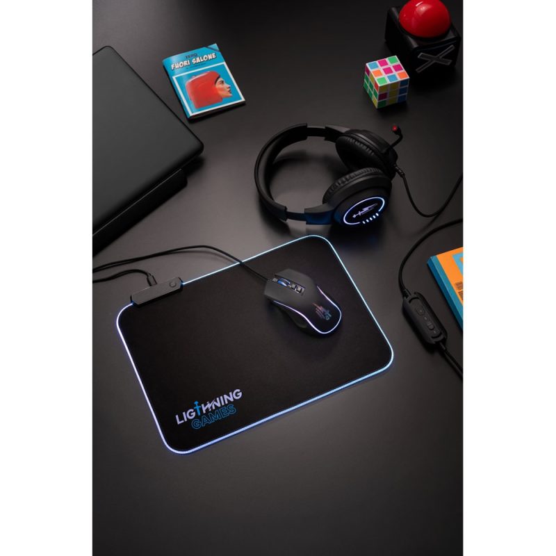 Gaming mouse and headset on illuminated mouse pad.