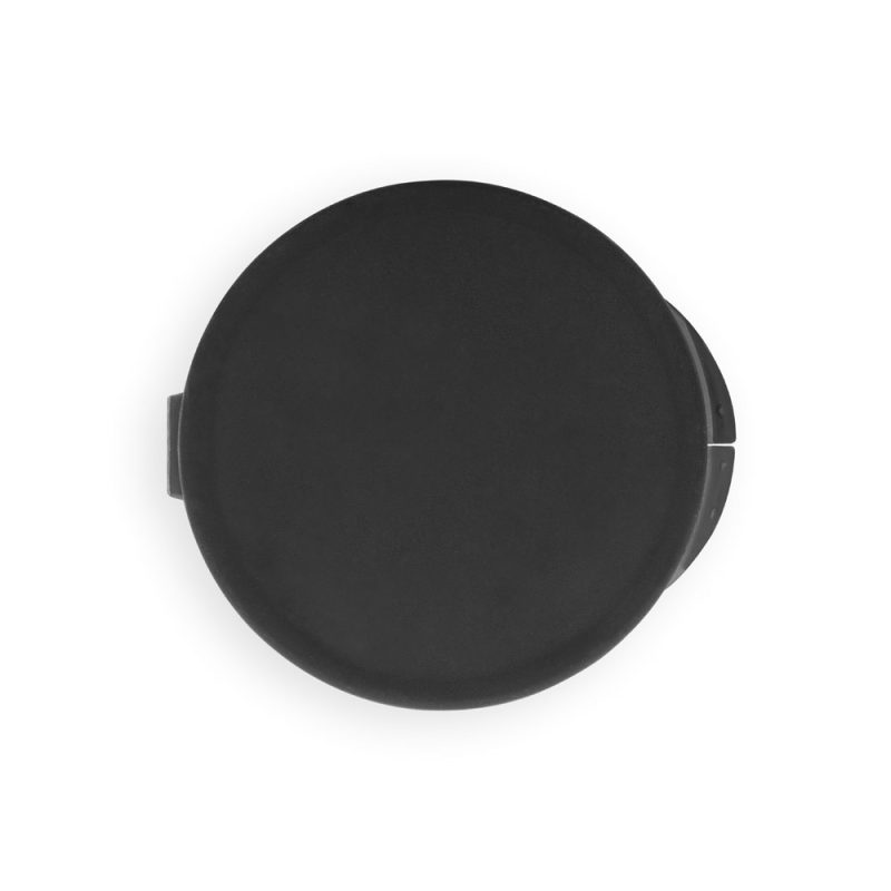 Top view of a large black round speaker.