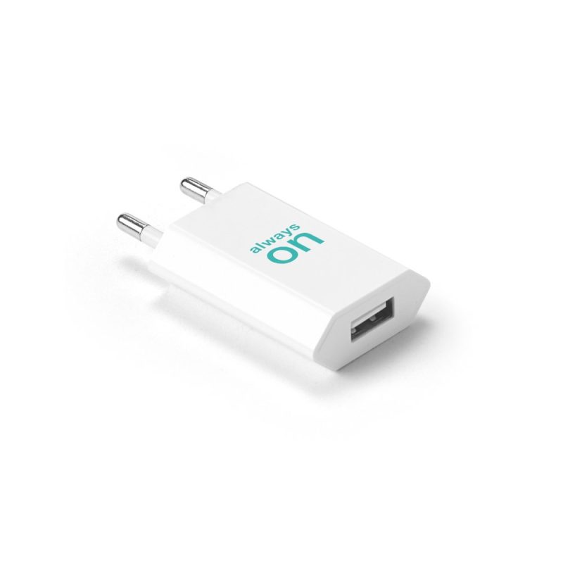 White USB wall charger with branding.