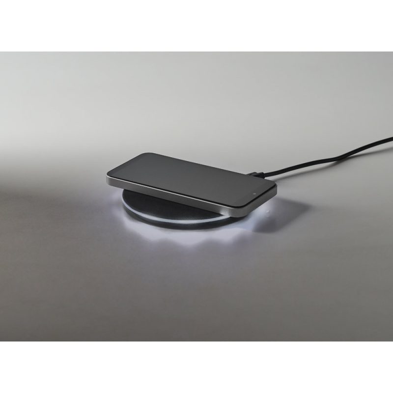 Smartphone on a wireless charging pad.