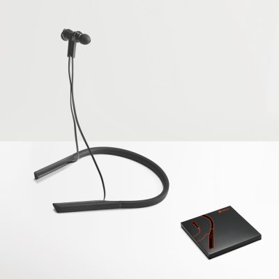 Black neckband earphones and packaging on display.