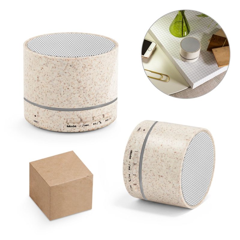 Eco-friendly cylindrical Bluetooth speaker on desk.