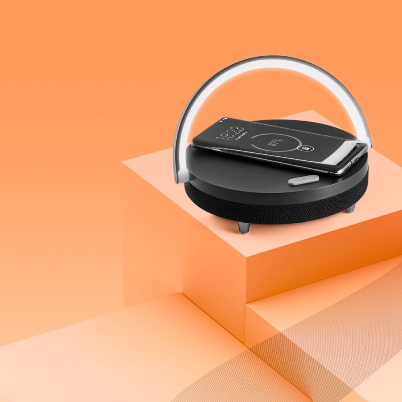 Wireless charger with phone on geometric design