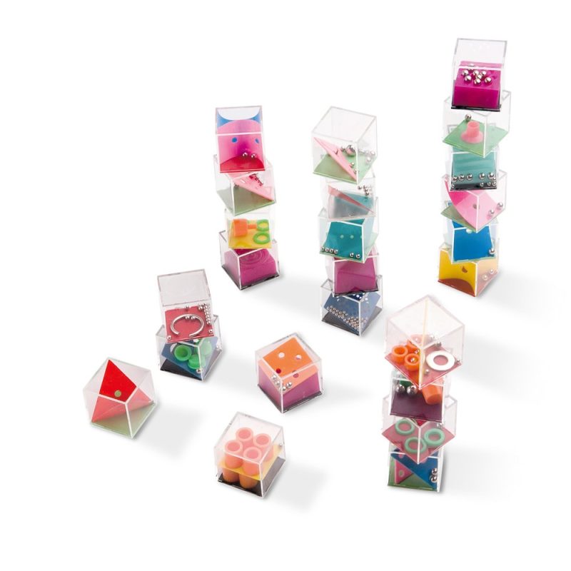 Colourful toy cubes stacked in creative arrangements.