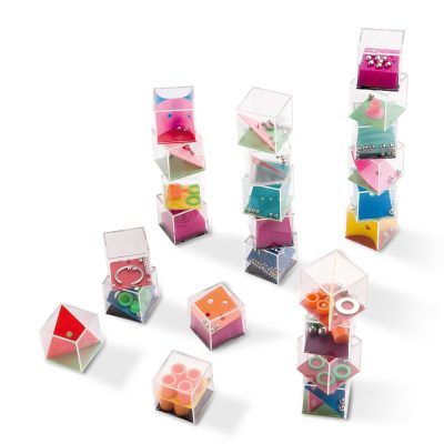 Colourful geometric puzzles in transparent boxes.